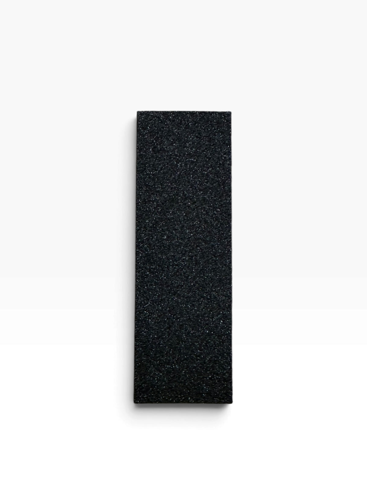 TP BEAUTY SUPPLY PTY LTD black rectangular nail buffing block for smoothing and polishing nails to a high-shine finish.