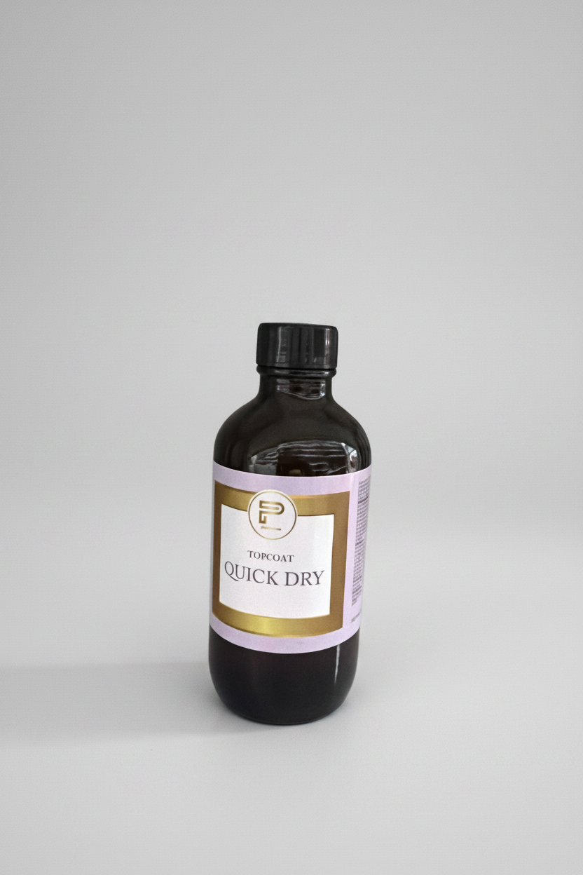 TP BEAUTY SUPPLY PTY LTD professional quick dry nail polish topcoat in a dark amber glass bottle on a white shelf.