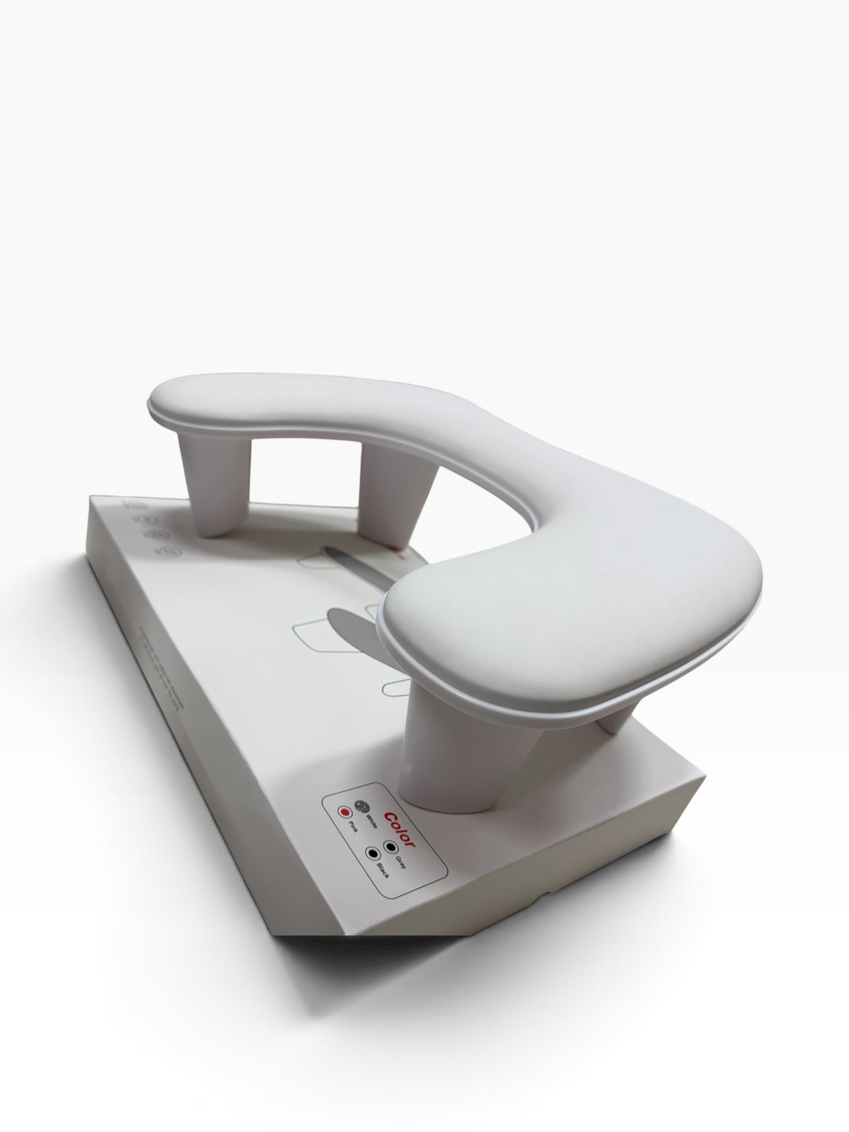 TP BEAUTY SUPPLY PTY LTD white ergonomic manicure hand rest pillow with a sturdy base for professional nail salons.